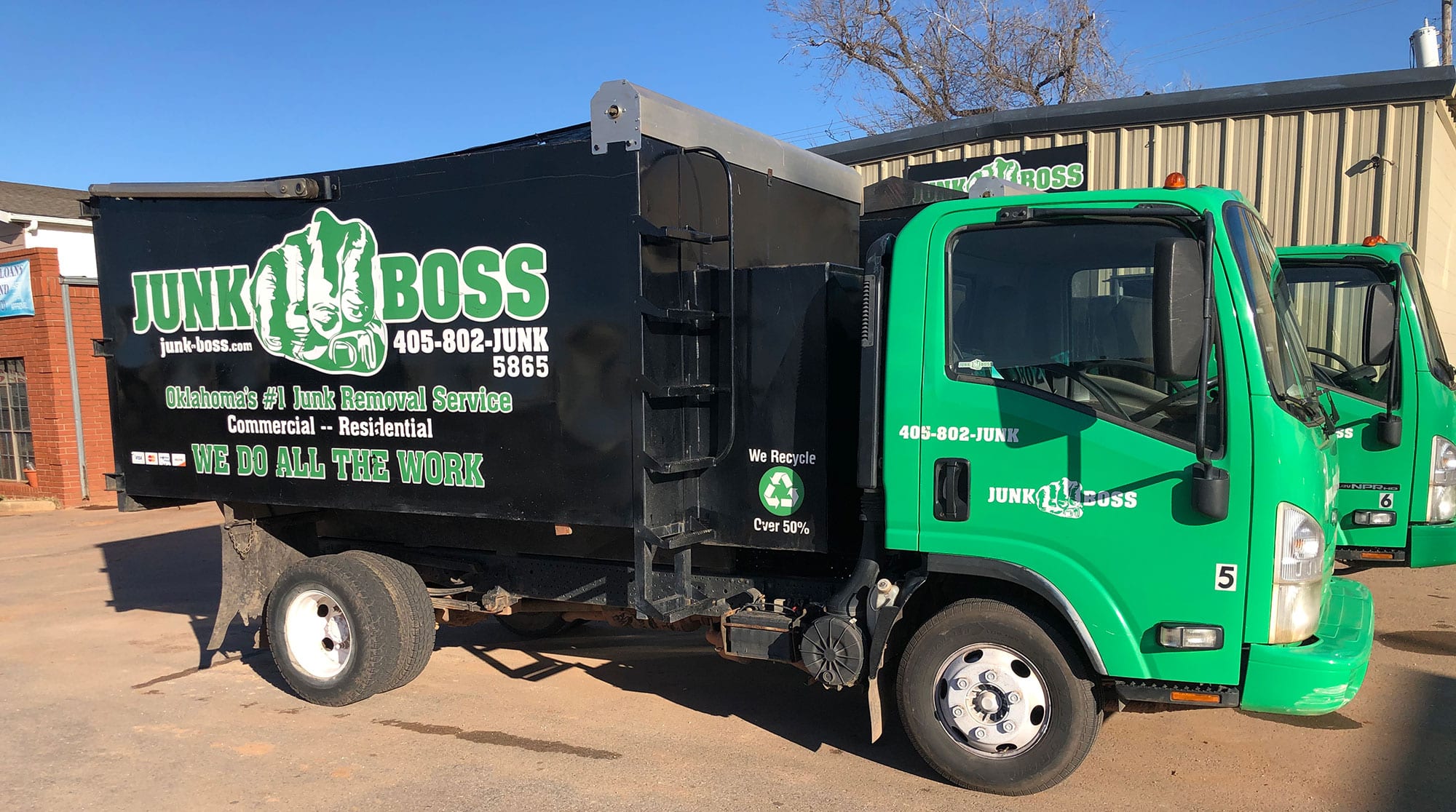 Junk Boss Service Vehicles Used To Deliver Dumpsters