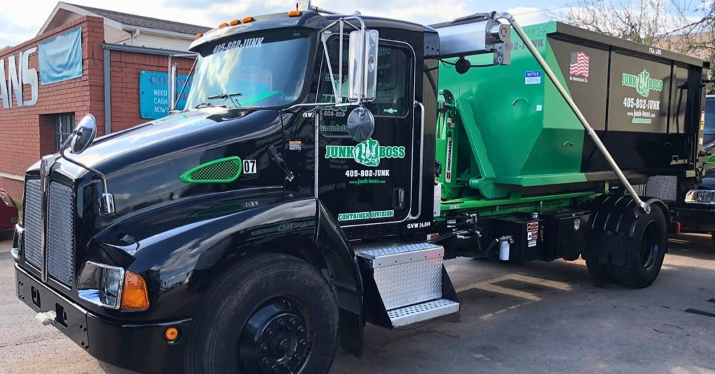 Junk Boss truck delivering a same-day dumpster rental in Oklahoma City.