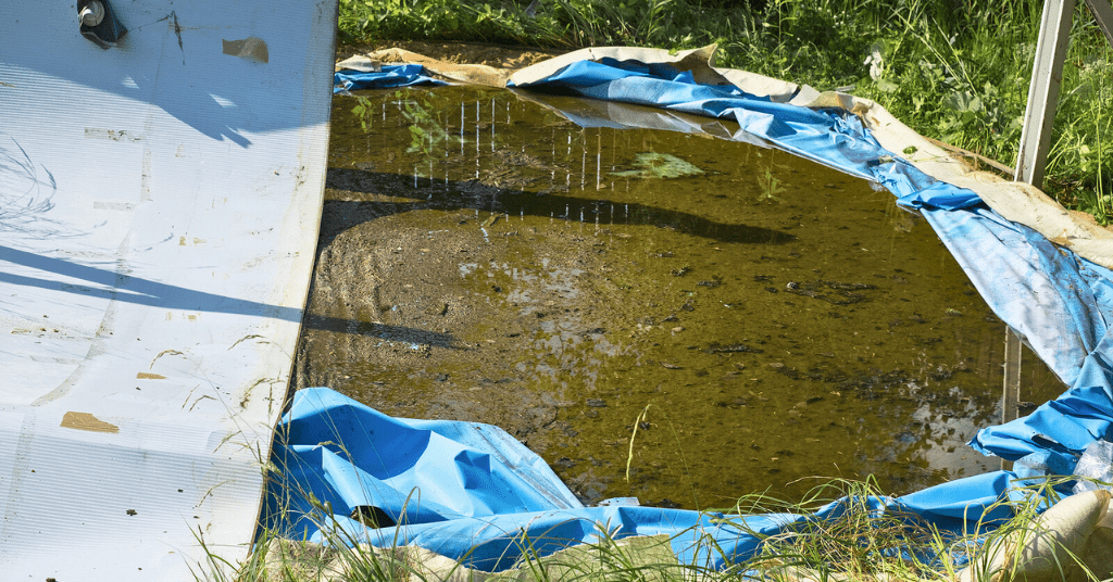 Crew dismantling an above-ground pool for removal and disposal in Oklahoma City, OK