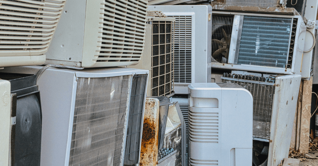 Pile of old air conditioners prepared for recycling and disposal in Oklahoma City, OK
